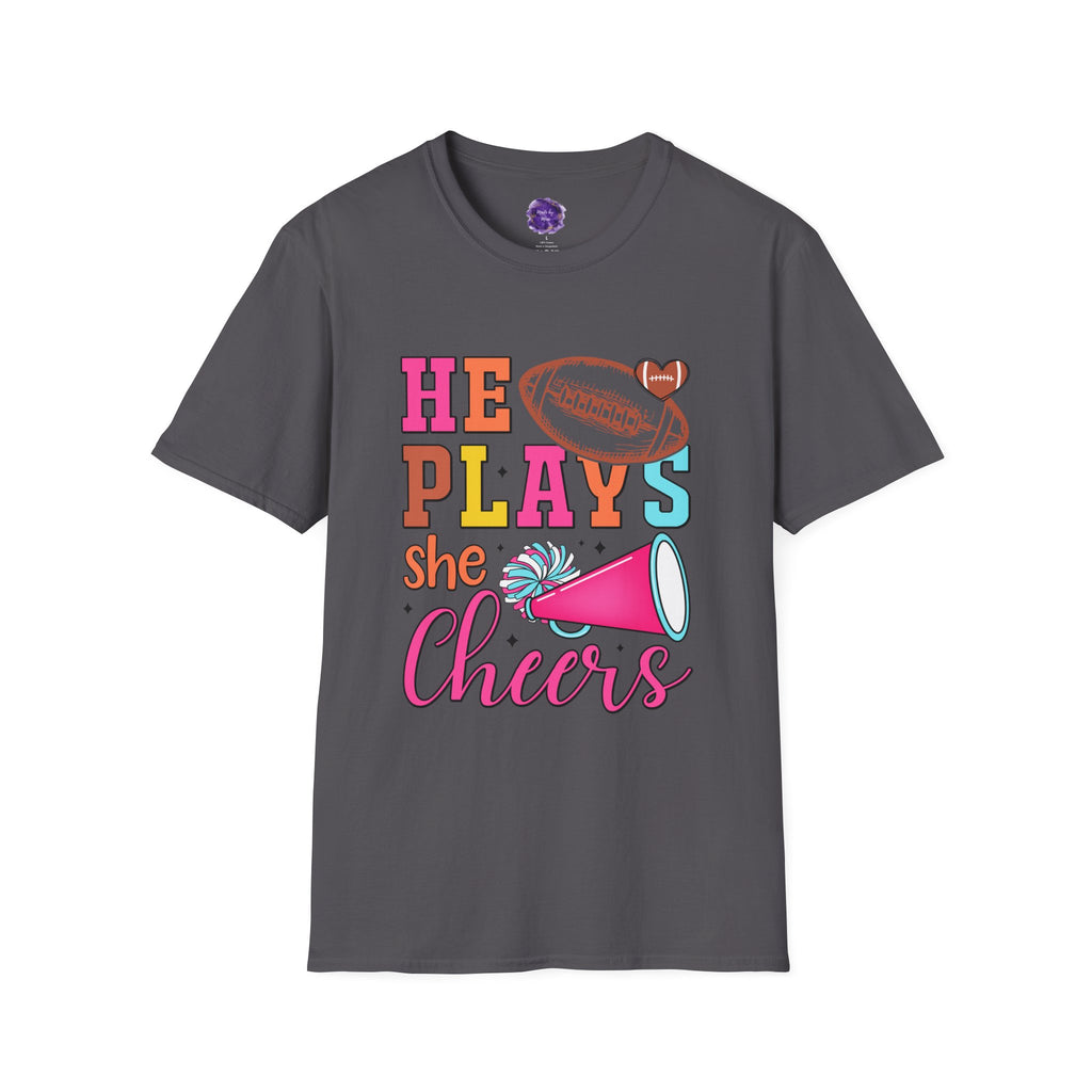 HE PLAYS, SHE CHEERS,  Unisex Softstyle T-Shirt | Supportive Gift for Cheerleading Parents, Sports Events, Game Day Tee